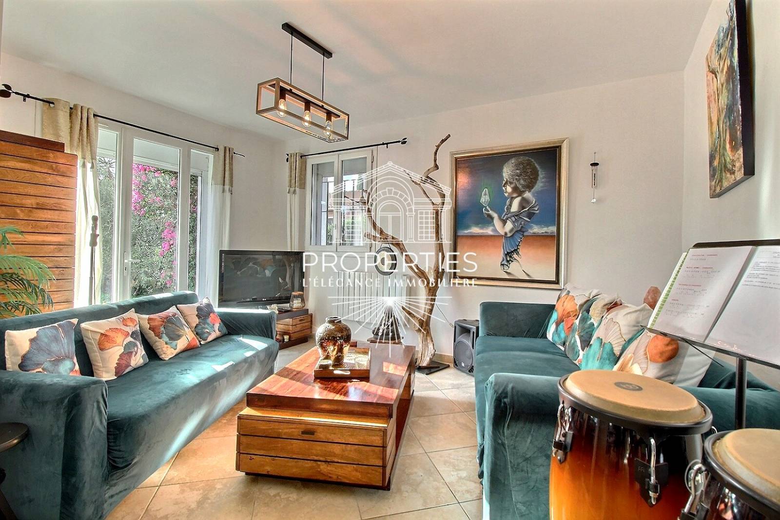 À VENDRE bien rare de plain-pied avec jardin et potentiel locatif dans secteur recherché